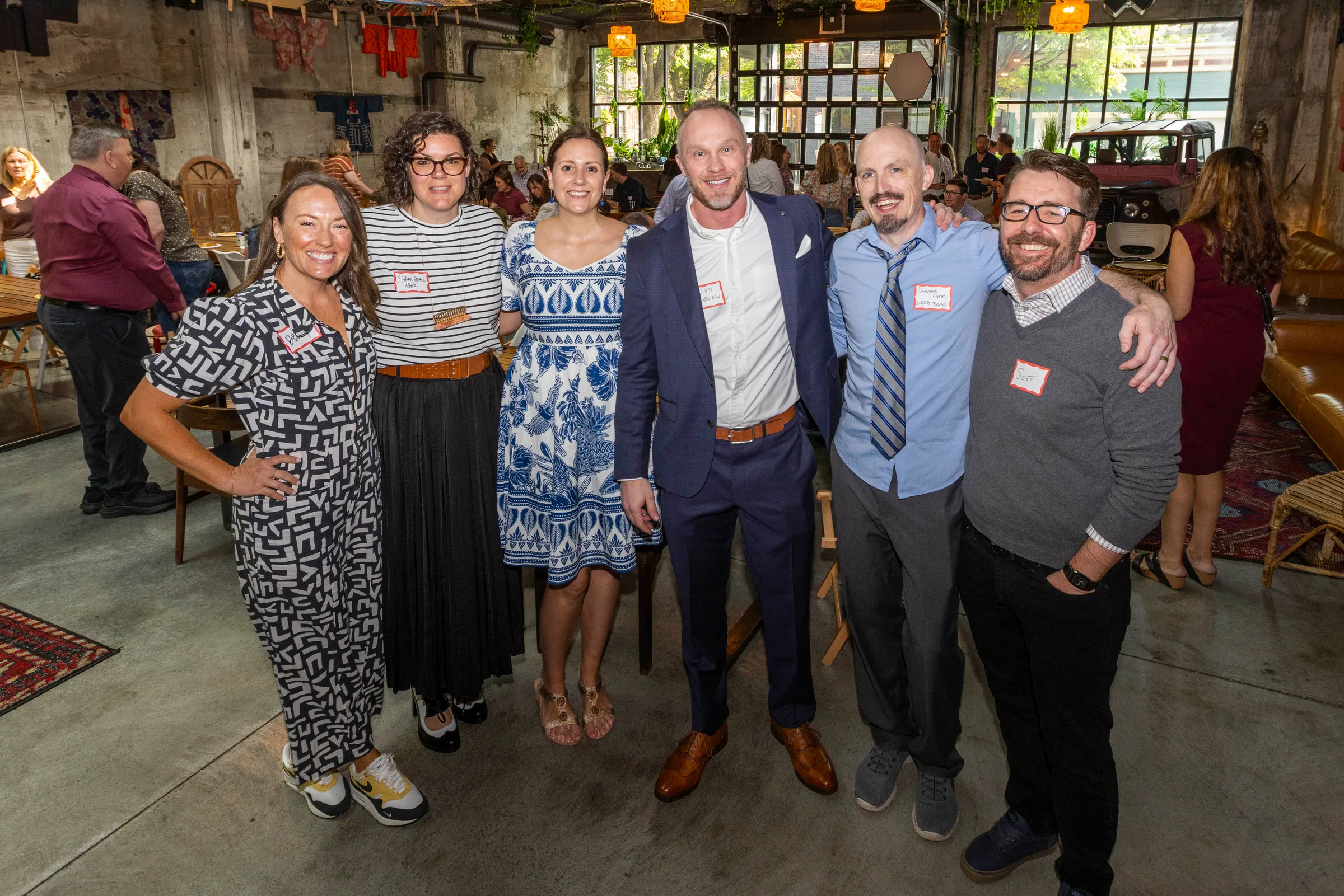 The Envision Promotions team together at a partner event